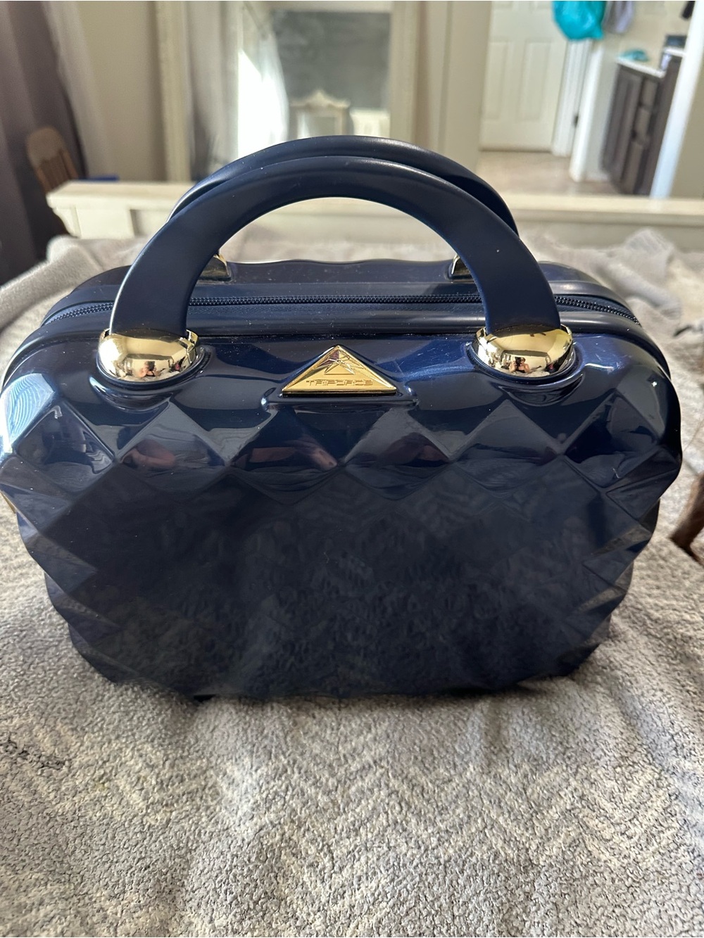 Triforce Glossy hard shell Navy Cosmetic Case with Gold Accents. Some scratches.